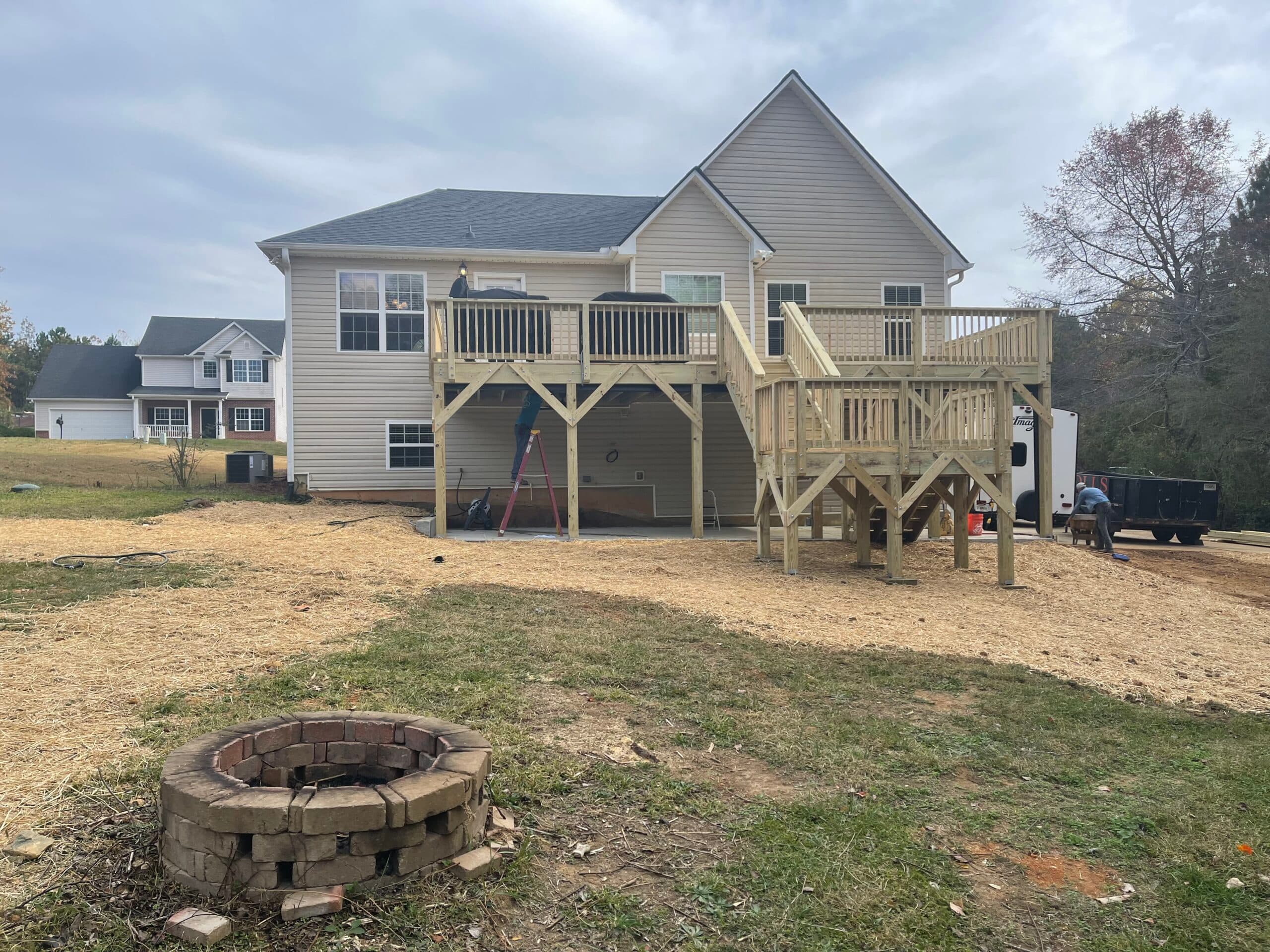 Concrete pad, deck, Trex rain escape