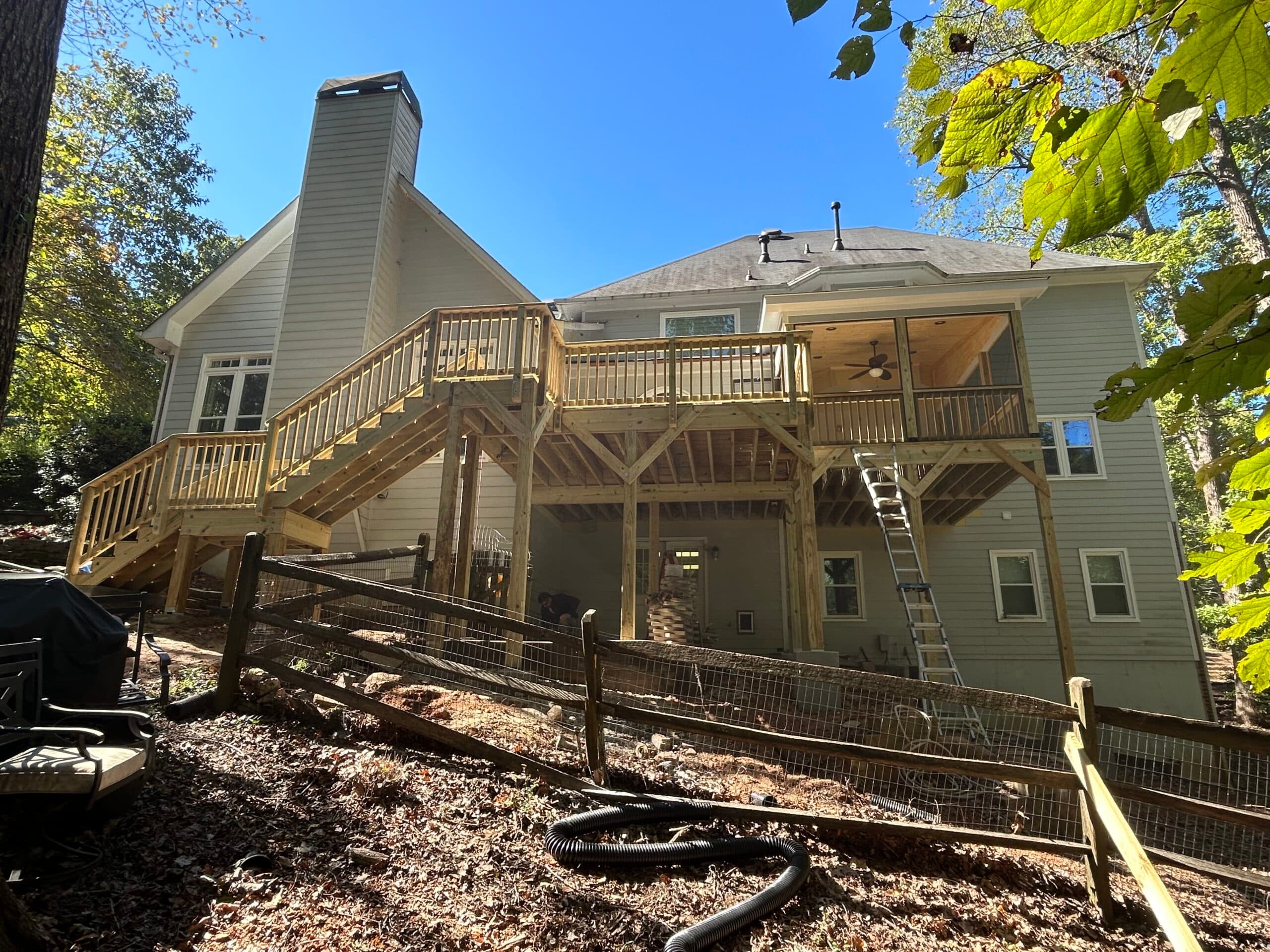 15x18 and 13x15 decks. Built shed roof and screened in 13x15 area