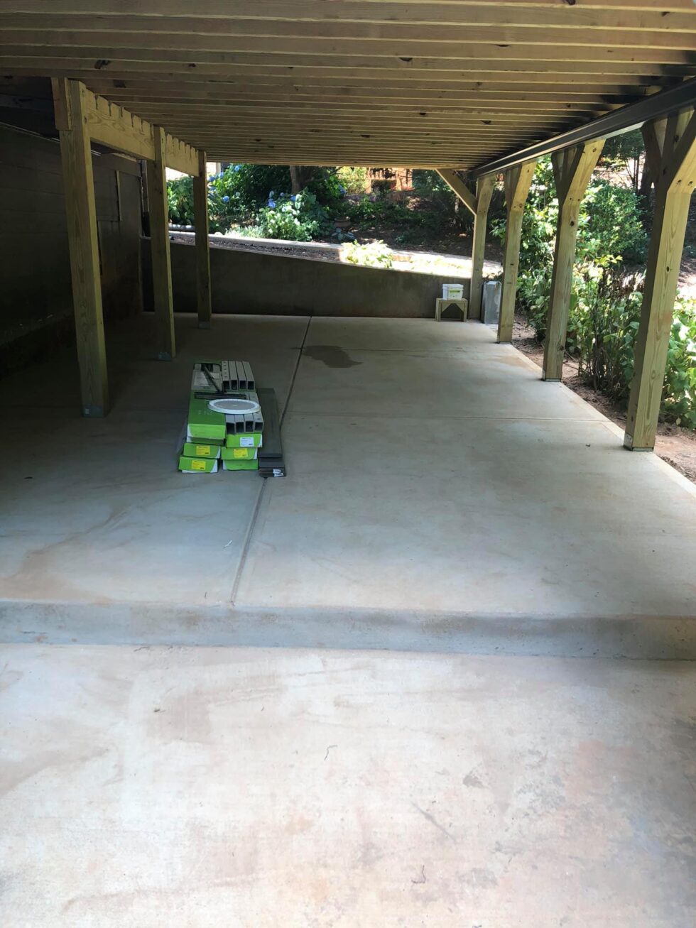 Deck, concrete pad, trex decking and trex under decking Bolls